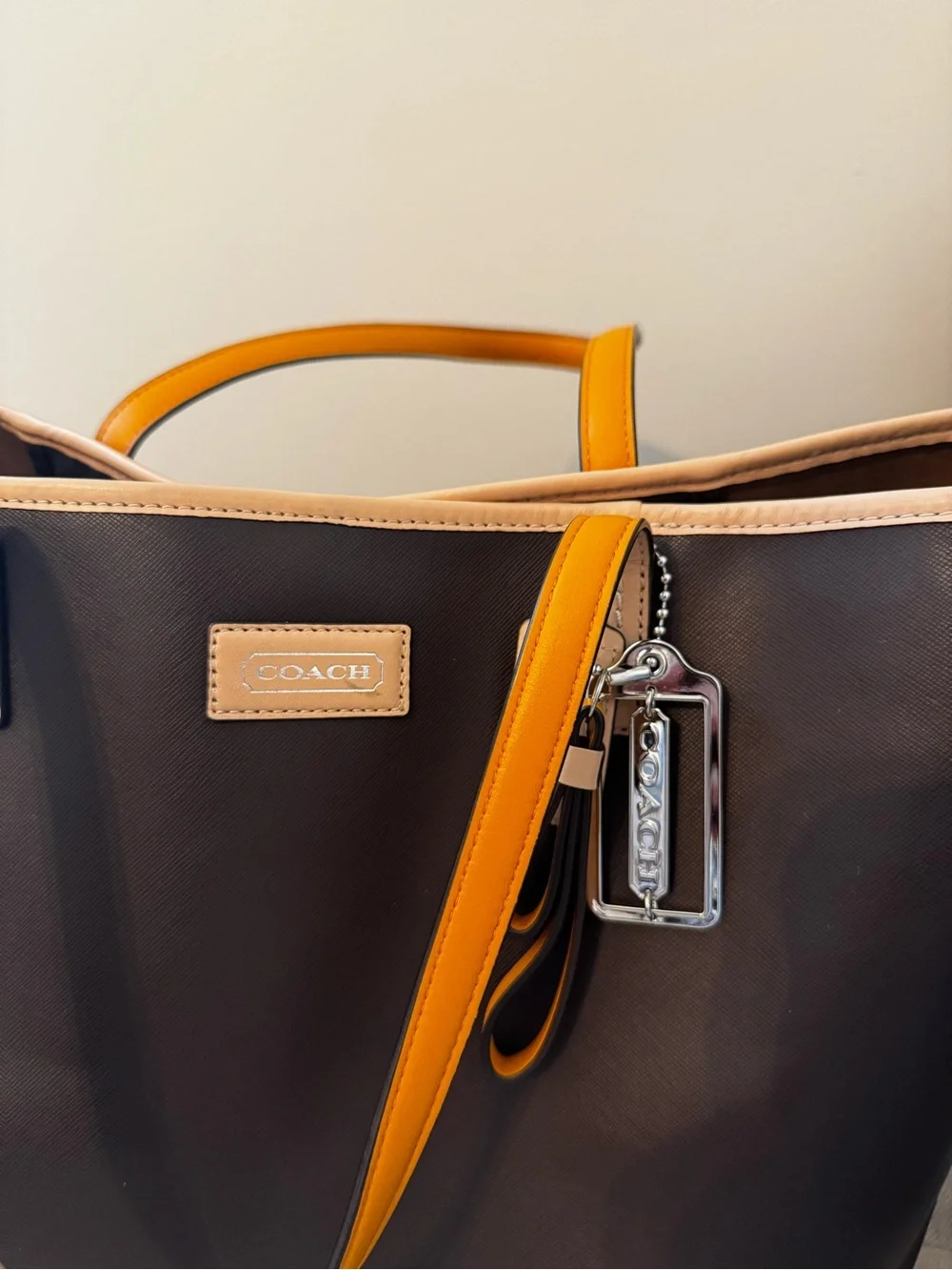 Coach Dark Brown Tote with Orange Trim and Handles